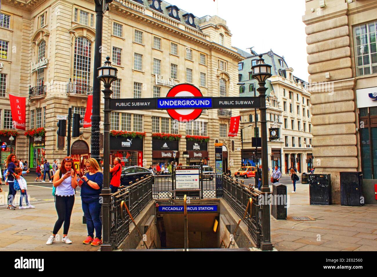 Piccadilly Circus tube station entrance .Piccadilly Circus is a road
